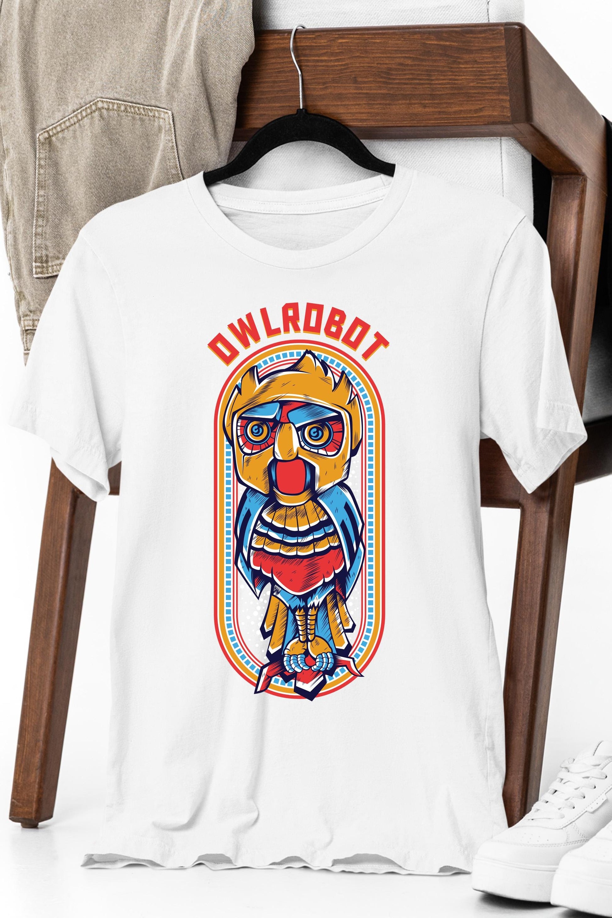 a white t - shirt with a picture of a bear on it