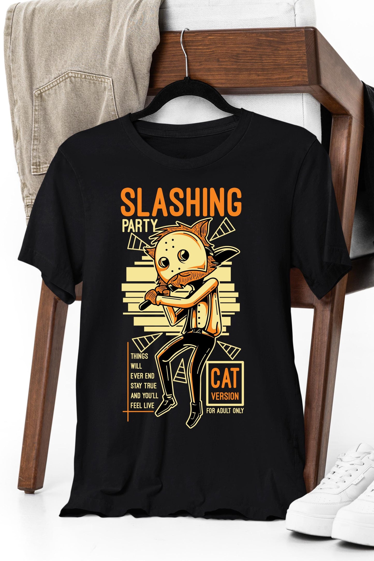 a black t - shirt with a picture of a cartoon character holding a bat