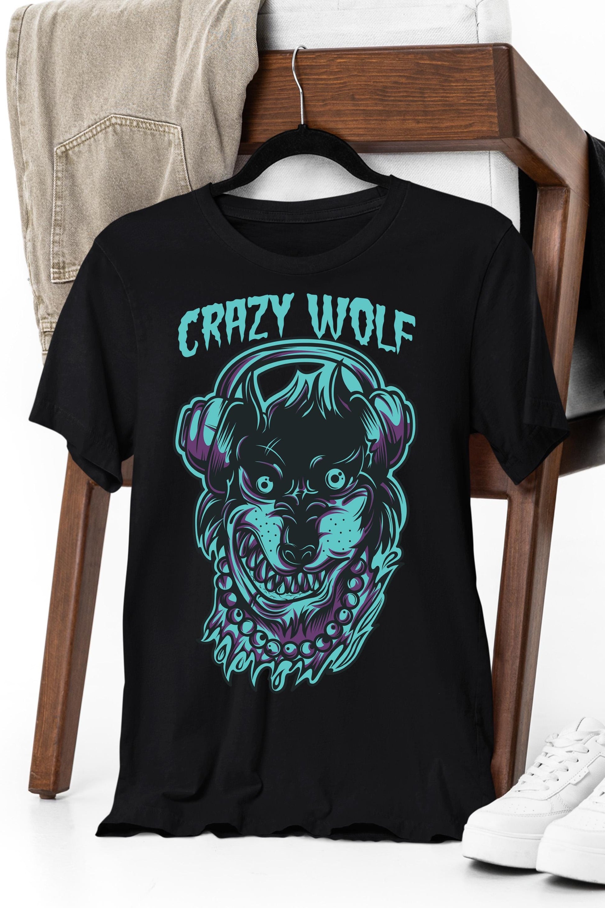 a black t - shirt with an image of a wolf wearing headphones