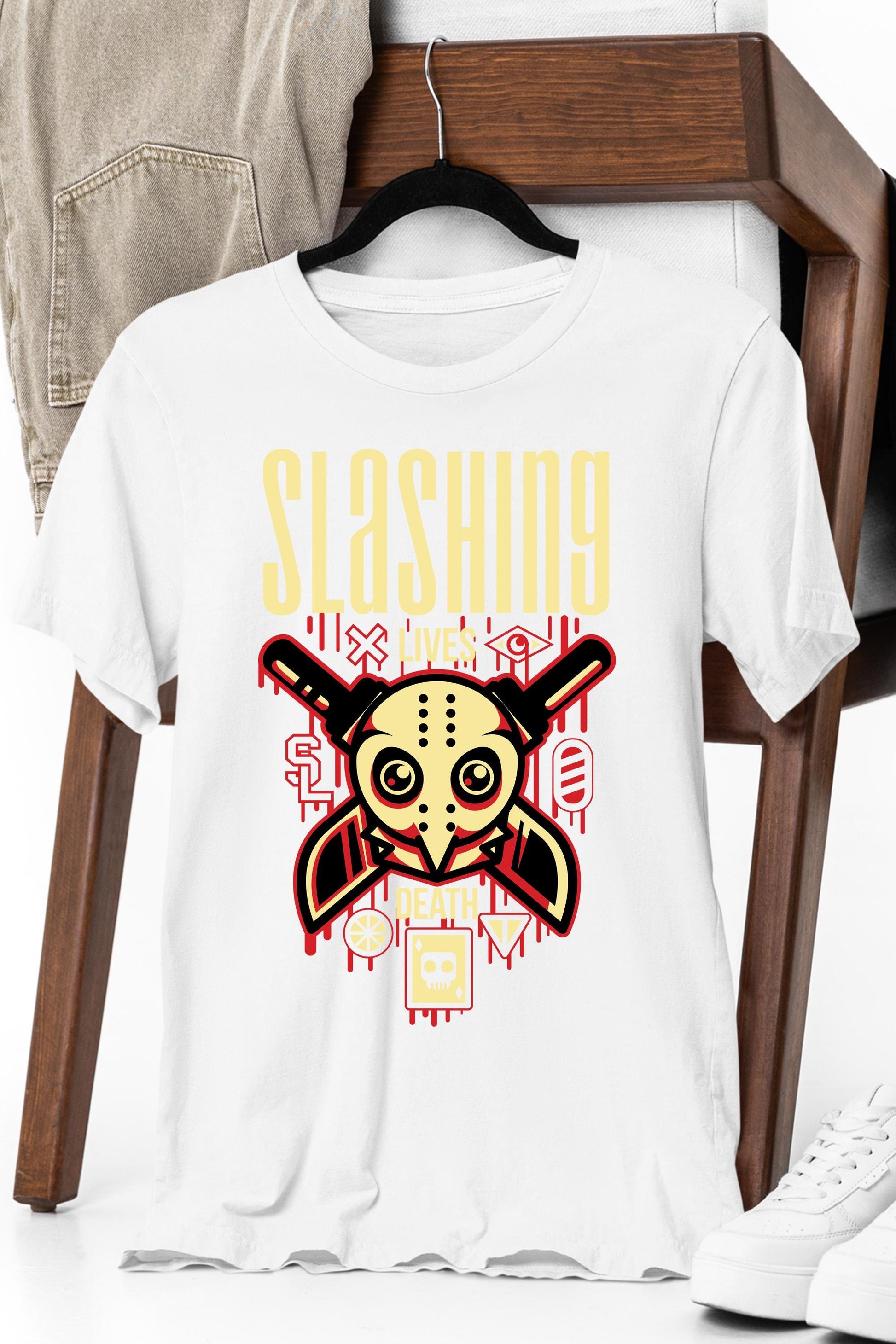 a white t - shirt with a skull and crossed swords on it
