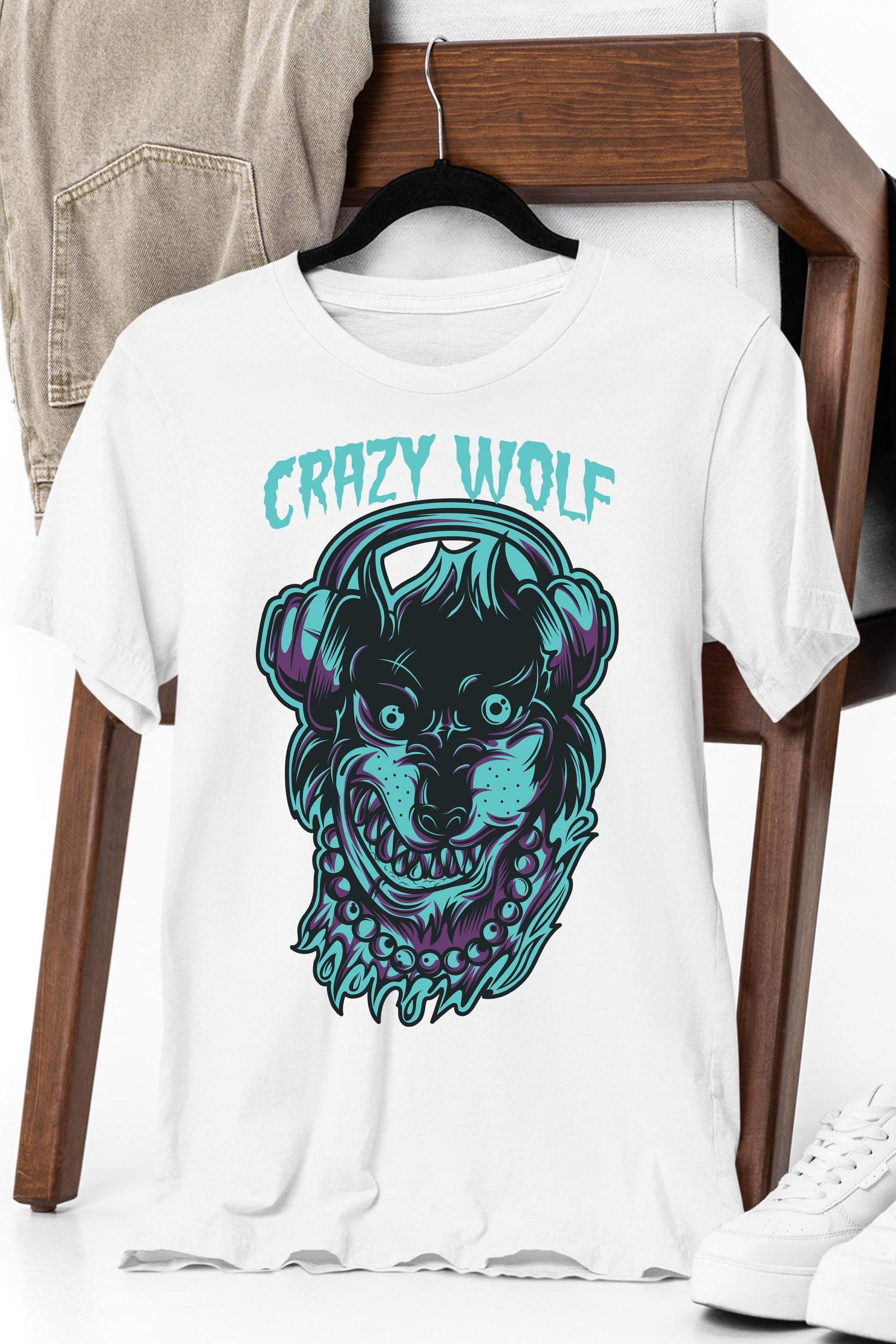 a white t - shirt with an image of a wolf wearing headphones