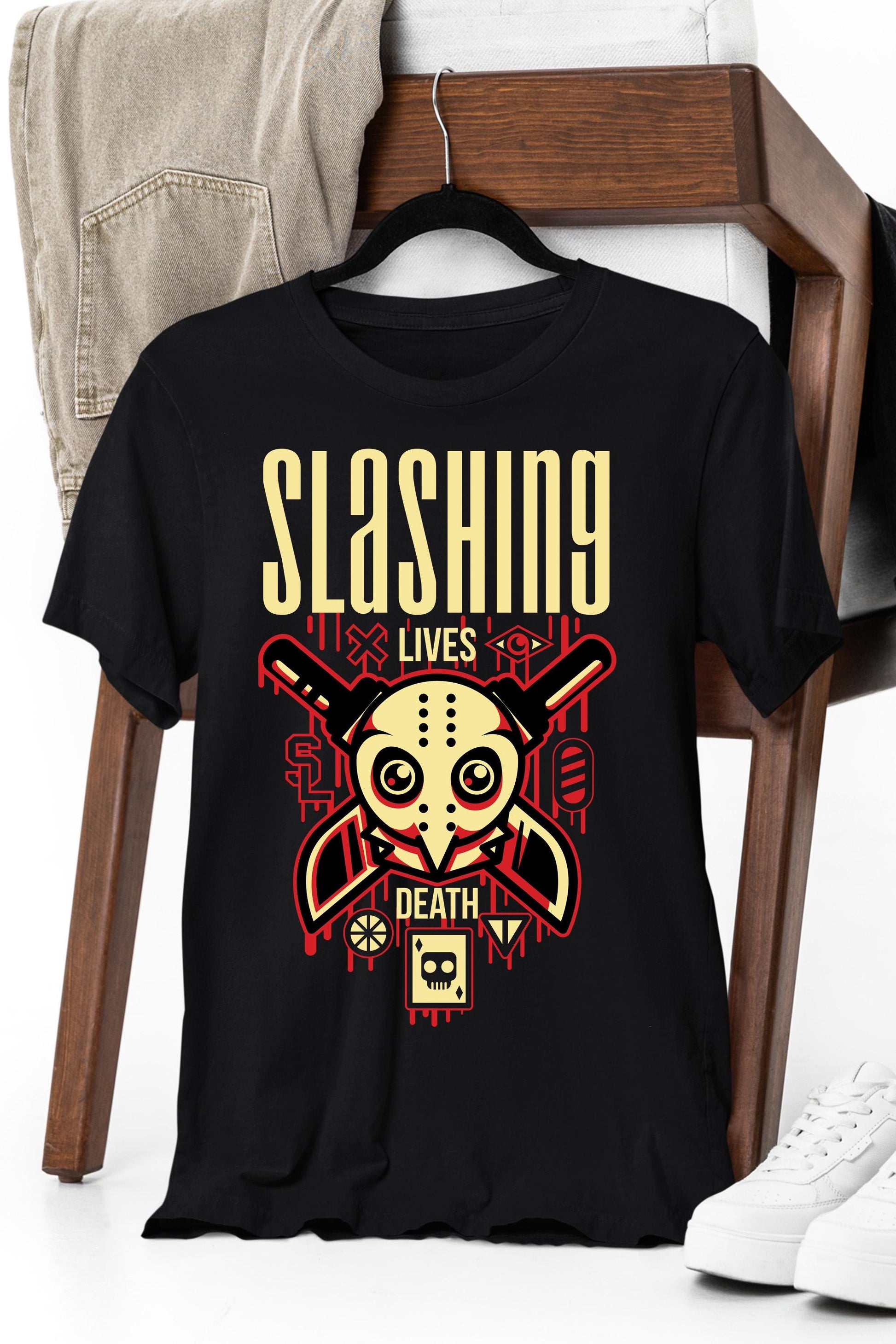 a black t - shirt with a skull and a baseball bat on it