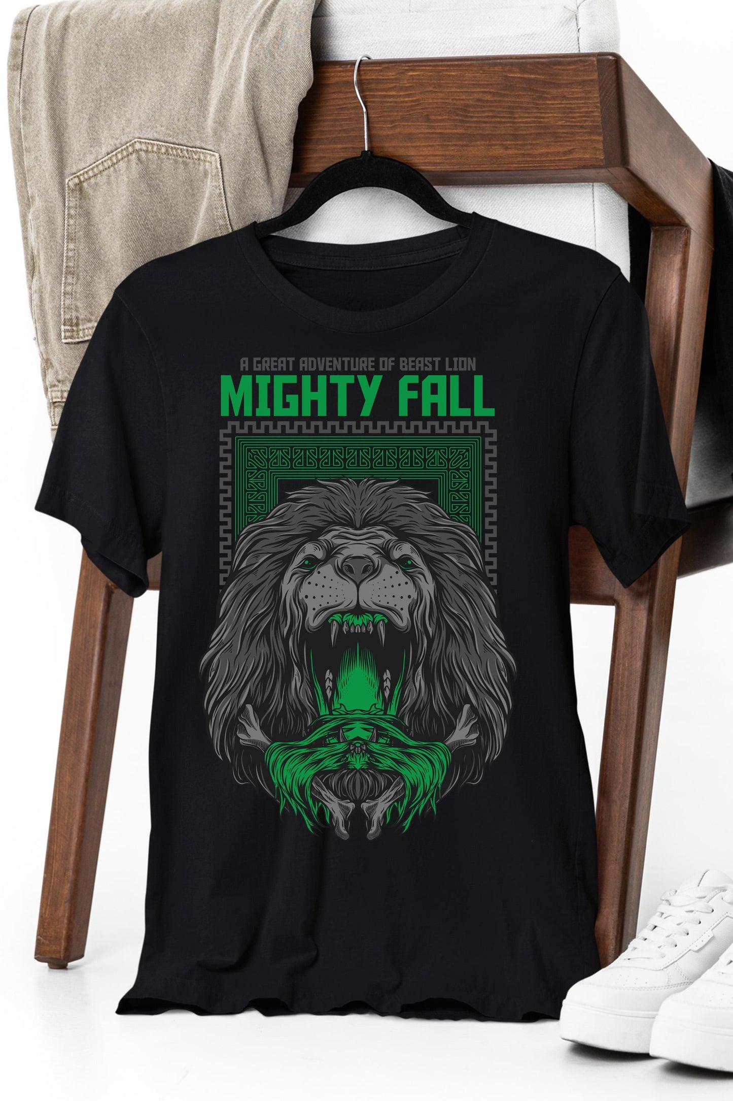 a black t - shirt with a green lion on it